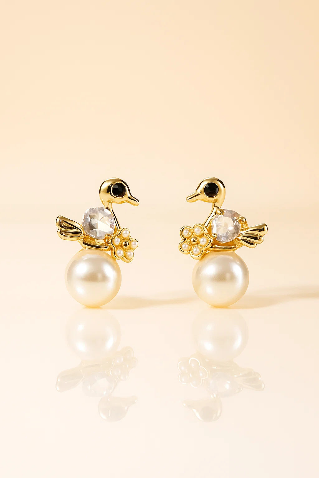 Swan pearl stud earrings